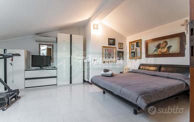 AMPIO 3 LOCALI MANSARDATO IN PLURIFAMILIARE