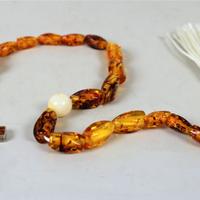 Rosario in ambra e argento