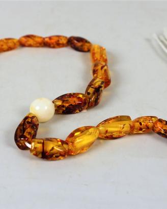 Rosario in ambra e argento