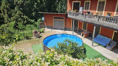 CASA SEMINDIPENDENTE A STRONA