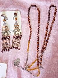 Soldini collana e orecchini