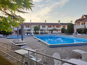 APPARTAMENTO CON GIARDINO PRIVATO E GARAGE