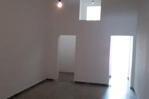 Tre ampi locali e giardino sul retro