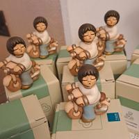 10 pezzi bimbi su motoretta thun