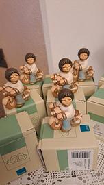 10 pezzi bimbi su motoretta thun