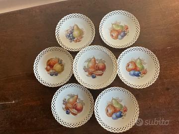Set di 12 piatti in porcellana traforata Schumann