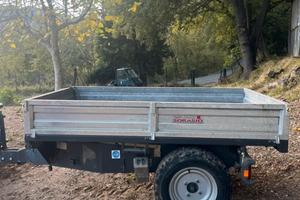 Rimorchio trazionato ribaltabile tre lati