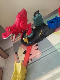 Hot Wheels Assalto del T-Rex, con Lanciatore