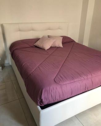 Letto contenitore matrimoniale.