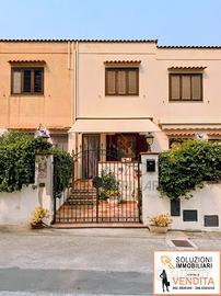 Villetta a schiera con veranda