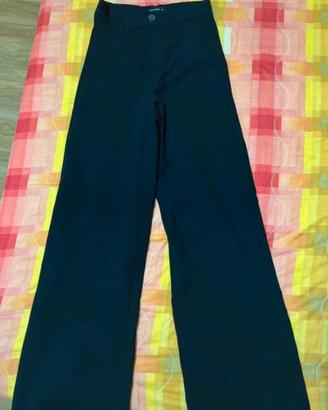 Pantalone neri eleganti a palazzo