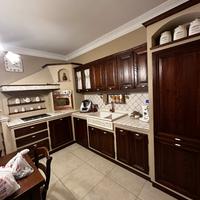 Cucina angolare in finta muratura