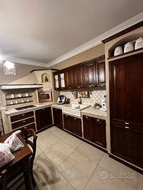 Cucina angolare in finta muratura