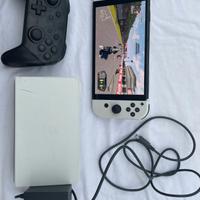Nintendo switch oled + giochi + joystick 