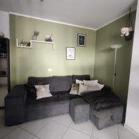 Divano-letto quattro posti con penisola