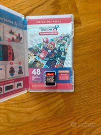 MARIOKART 8 Delux Nintendo Switch + volantini ecc