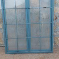 finestra con grata in ferro 