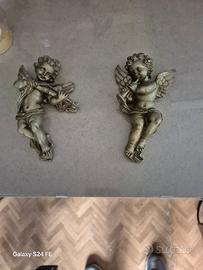 coppia di angeli in legno