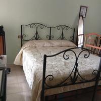 letto matrimoniale in ferro battuto con rete