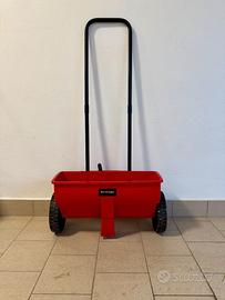 Seminatrice prato a spinta con apertura regolabile