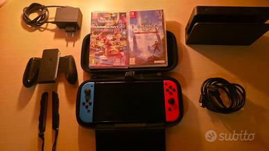 nintendo switch oled + 2 giochi + scatola