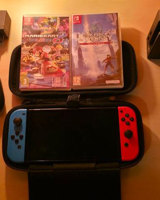 nintendo switch oled + 2 giochi + scatola