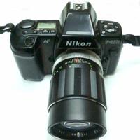 14D NIKON AF-801S+TELE SOLIGOR AUTO MM.135