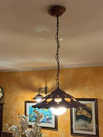 Lampadari e applique in terracotta e ferro battuo