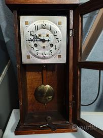 Pendolo antico orologio da parete