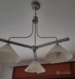 Lampadario moderno in acciaio e vetro