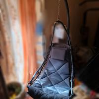 Poltrona dondolo con seduta oscillante sospesa