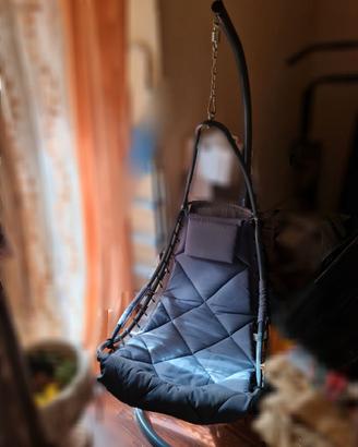 Poltrona dondolo con seduta oscillante sospesa