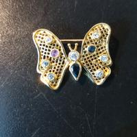 Spilla in oro a forma di farfalla