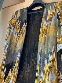 Giacca elegante con paillettes e coralli