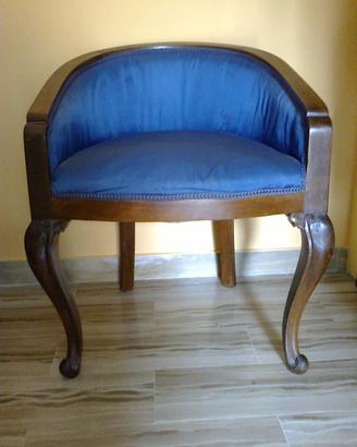 Coppia di poltroncine a pozzetto
