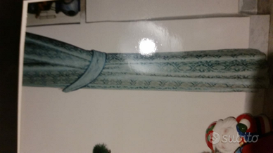 Discese laterali copri tenda