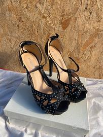 Scarpe con tacco alto