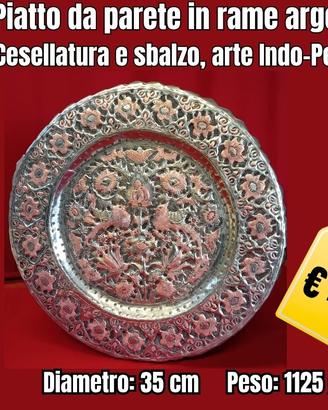 Piatto da parete in rame argentato con cesellatura
