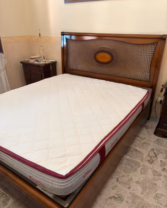 Letto matrimoniale a contenitore in legno massello