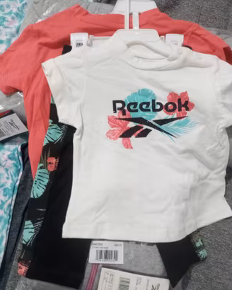 Stock abbigliamento bimbi