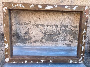 Cornice intagliata in oro del 1920