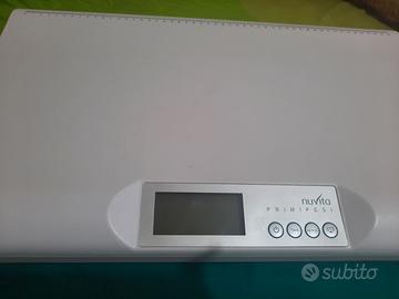 Bilancia Nuvita + Cuscino allattamento BoppyChicco