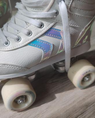 Pattini a rotelle tg34 + kit di protezione + borsa