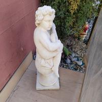 Statua in cemento bianco