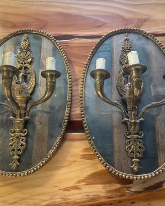 Coppia di applique con candelabro in ottone