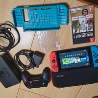 Nintendo switch + giochi  / HAC 001  XAJ 400365767