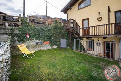 Appartamento con giardino e posto auto