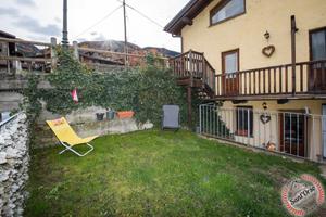 Appartamento con giardino e posto auto