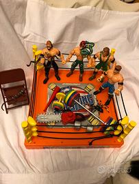 Wrestling gioco con action figures e attrezzi