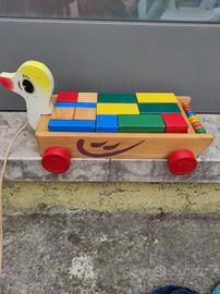 Vecchio giocattolo legno oca cubi